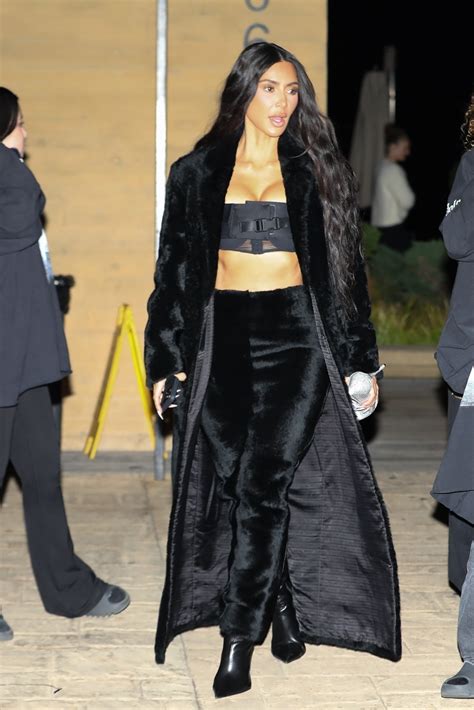 Kim Kardashian rocks fur maxi skirt and $13K coat for dinner with .